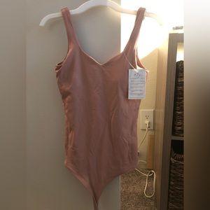 Blush bodysuit with pads, size XS